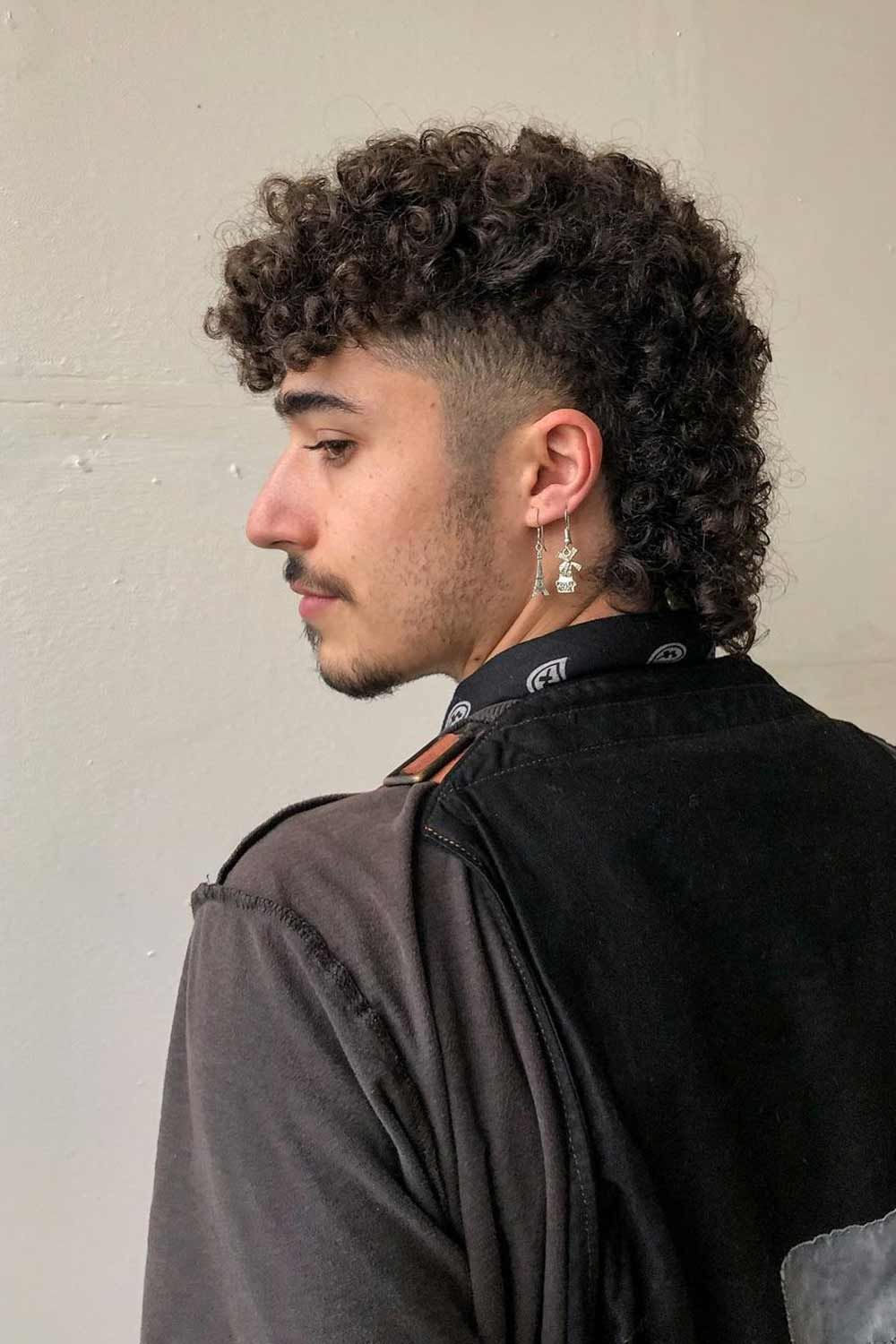 12 Trendsetting Curly Mullet Haircut Ideas for 2024 - Stylorize