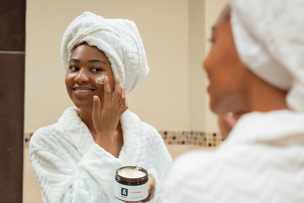 A person applying cream on her face AI-generated content may be incorrect.